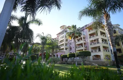 Apartment - 2 Bedrooms - 2 Bathrooms for sale in Dream Land - Al Wahat Road - 6 October City - Giza