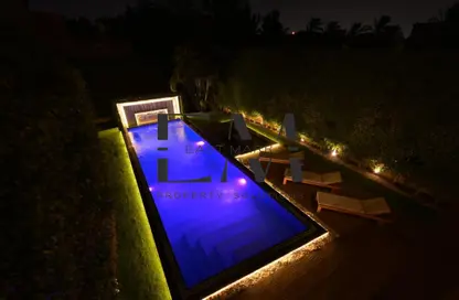 Villa - 4 Bedrooms - 5 Bathrooms for rent in Al Guezira Green Park - South Investors Area - New Cairo City - Cairo