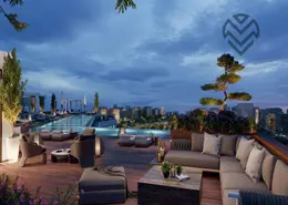 Hotel Apartment - 1 Bedroom - 1 Bathroom for sale in Nile Business City - Downtown Area - New Capital City - Cairo