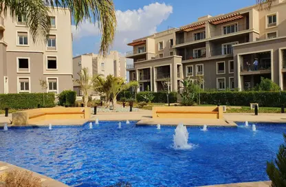 Apartment - 2 Bedrooms - 3 Bathrooms for sale in October Plaza - 6 October Compounds - 6 October City - Giza