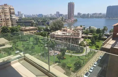 شقة - 3 غرف نوم - 3 حمامات للايجار في شارع النيل - الدقي - الجيزة