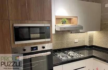 شقة - 2 غرف نوم - 2 حمامات للايجار في مون ريزيدنس - فيفث سكوير - التجمع الخامس - مدينة القاهرة الجديدة - القاهرة
