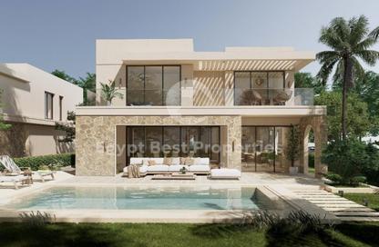 Villa - 4 Bedrooms - 5 Bathrooms for sale in Beit Al Bahr - Sidi Heneish - North Coast