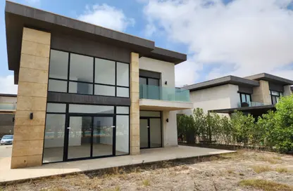 Villa - 4 Bedrooms - 4 Bathrooms for sale in Swan Lake North Coast - Qesm Ad Dabaah - North Coast