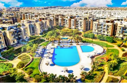 Apartment - 2 Bedrooms - 2 Bathrooms for sale in Galleria Moon Valley - South Investors Area - New Cairo City - Cairo