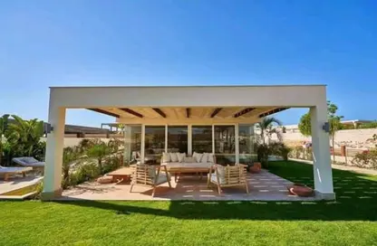 Villa - 4 Bedrooms - 4 Bathrooms for sale in Ramla Lakeside - Qesm Ad Dabaah - North Coast