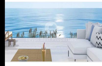 Chalet - 2 Bedrooms - 3 Bathrooms for sale in Ramla Lakeside - Qesm Ad Dabaah - North Coast