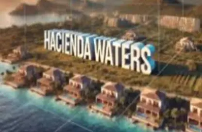 Chalet - 2 Bedrooms - 2 Bathrooms for sale in Hacienda Waters - Qesm Ad Dabaah - North Coast
