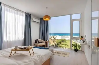 Chalet - 2 Bedrooms - 2 Bathrooms for sale in Beit Al Bahr - Sidi Heneish - North Coast