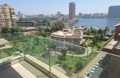 Apartment - 3 Bedrooms - 3 Bathrooms for rent in Nile St. - Dokki - Giza