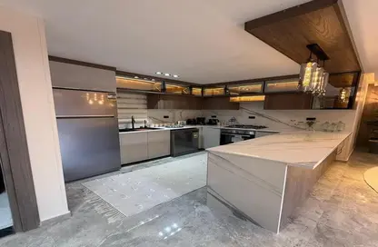 Apartment - 1 Bedroom - 2 Bathrooms for sale in Swan Lake Residence - 5th Settlement Compounds - The 5th Settlement - New Cairo City - Cairo