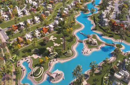 Chalet - 2 Bedrooms - 2 Bathrooms for sale in Makadi Orascom Resort - Makadi - Hurghada - Red Sea