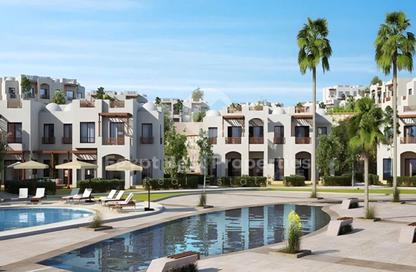 Chalet - 2 Bedrooms - 2 Bathrooms for sale in Makadi Orascom Resort - Makadi - Hurghada - Red Sea