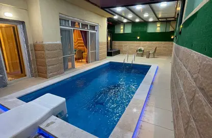 Apartment - 3 Bedrooms - 2 Bathrooms for sale in Al Bostan St. - 9th District - Sheikh Zayed City - Giza