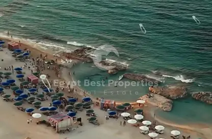 Chalet - 2 Bedrooms - 2 Bathrooms for sale in Ramla Lakeside - Qesm Ad Dabaah - North Coast