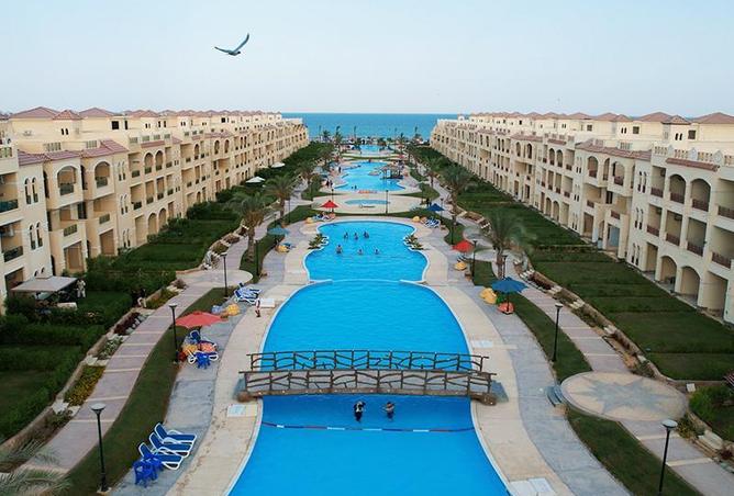 Duplex - 4 Bedrooms - 4 Bathrooms for sale in Lasirena Palm Beach - Al Ain Al Sokhna - Suez