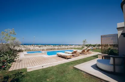 Villa - 4 Bedrooms - 4 Bathrooms for sale in Beit Al Bahr - Sidi Heneish - North Coast