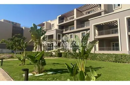 Apartment - 2 Bedrooms - 3 Bathrooms for sale in October Plaza - 6 October Compounds - 6 October City - Giza