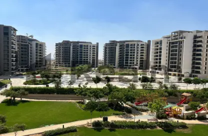 Apartment - 2 Bedrooms - 2 Bathrooms for sale in Belle Vie - New Zayed City - Sheikh Zayed City - Giza