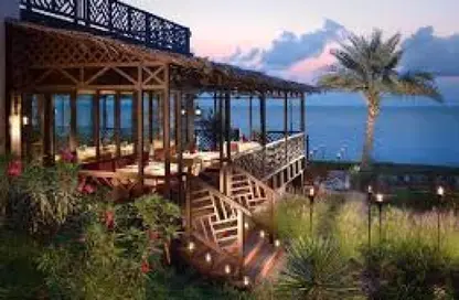 Chalet - 2 Bedrooms - 3 Bathrooms for sale in Beit Al Bahr - Sidi Heneish - North Coast
