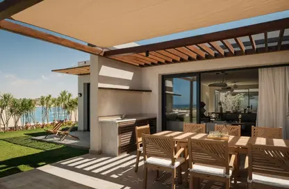 Villa - 4 Bedrooms - 4 Bathrooms for sale in Beit Al Bahr - Sidi Heneish - North Coast