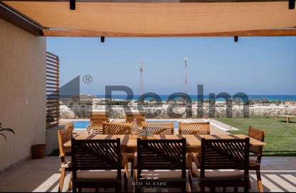 Chalet - 2 Bedrooms - 2 Bathrooms for sale in Beit Al Bahr - Sidi Heneish - North Coast