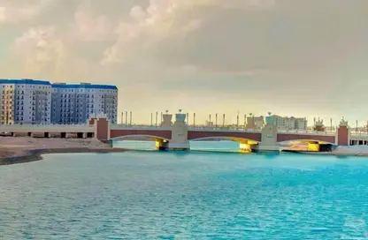 Chalet - 4 Bedrooms - 4 Bathrooms for sale in Latin District - New Alamein City - Al Alamein - North Coast