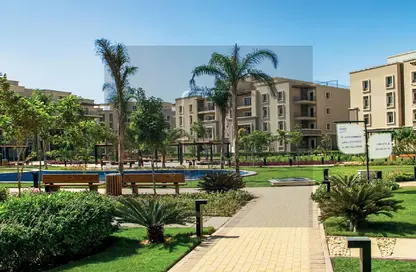 Apartment - 2 Bedrooms - 3 Bathrooms for sale in October Plaza - 6 October Compounds - 6 October City - Giza