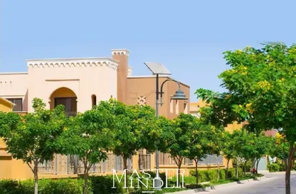 Villa - 6 Bedrooms - 5 Bathrooms for sale in Mivida - 5th Settlement Compounds - The 5th Settlement - New Cairo City - Cairo