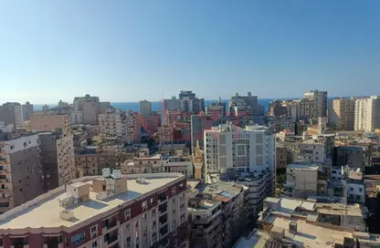 Apartment - 3 Bedrooms - 2 Bathrooms for sale in Ibn Al Barizi St. - Sporting - Hay Sharq - Alexandria
