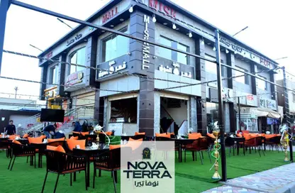 بناية كاملة - استوديو - 8 حمامات للبيع في الحي الاول - مدينة 6 أكتوبر - الجيزة