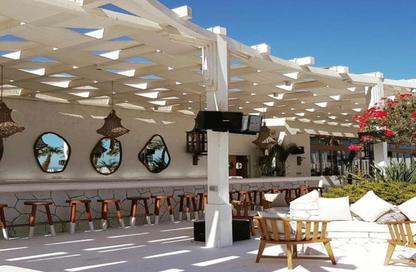 Chalet - 2 Bedrooms - 2 Bathrooms for sale in Hacienda Waters - Qesm Ad Dabaah - North Coast