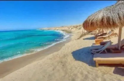 Chalet - 2 Bedrooms - 2 Bathrooms for sale in Mazarine - New Alamein City - Al Alamein - North Coast