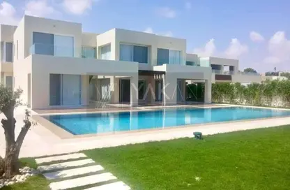 Chalet - 2 Bedrooms - 2 Bathrooms for sale in Hacienda Waters - Qesm Ad Dabaah - North Coast