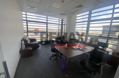 Office Space - Studio - 1 Bathroom for rent in Arkan Plaza - 26th of July Corridor - Sheikh Zayed City - Giza