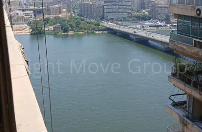 Apartment - 2 Bedrooms - 2 Bathrooms for sale in Nile St. - Dokki - Giza