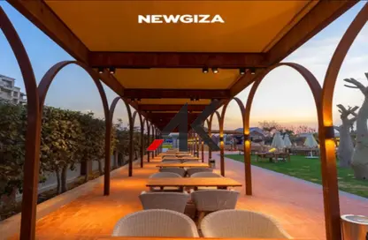 Twin House - 4 Bedrooms - 4 Bathrooms for sale in New Giza - Cairo Alexandria Desert Road - 6 October City - Giza