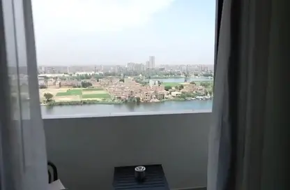 Hotel Apartment - 1 Bedroom - 1 Bathroom for sale in Reve Du Nil - Athar El Nabi - Hay Masr El Kadima - Cairo