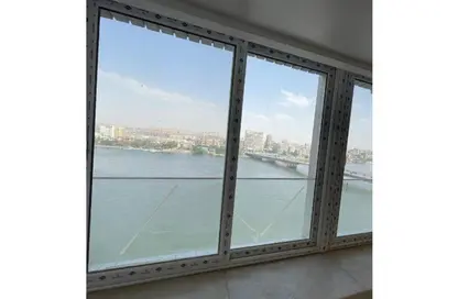 Apartment - 4 Bedrooms - 4 Bathrooms for sale in Nile St. - Dokki - Giza