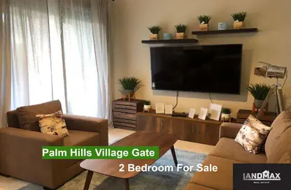 Apartment - 2 Bedrooms - 2 Bathrooms for sale in Palm Hills Village Gate - South Investors Area - New Cairo City - Cairo