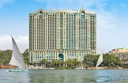 Hotel Apartment - 2 Bedrooms - 3 Bathrooms for sale in Garden City - Cairo