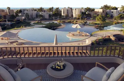Chalet - 2 Bedrooms - 2 Bathrooms for sale in Makadi Orascom Resort - Makadi - Hurghada - Red Sea