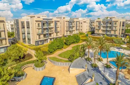 Apartment - 2 Bedrooms - 2 Bathrooms for sale in Galleria Moon Valley - South Investors Area - New Cairo City - Cairo