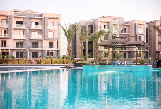Apartment - 2 Bedrooms - 2 Bathrooms for sale in Galleria Moon Valley - South Investors Area - New Cairo City - Cairo