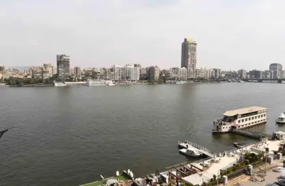 شقة - 4 غرف نوم - 2 حمامات للبيع في شارع النيل - الدقي - الجيزة