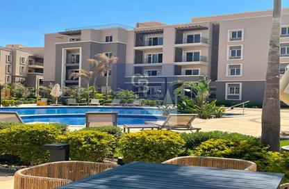 Apartment - 2 Bedrooms - 3 Bathrooms for sale in October Plaza - 6 October Compounds - 6 October City - Giza