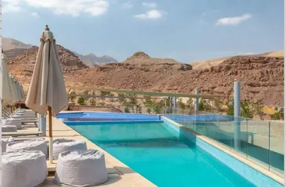 Chalet - 2 Bedrooms - 2 Bathrooms for sale in Al Ain Al Sokhna - Suez
