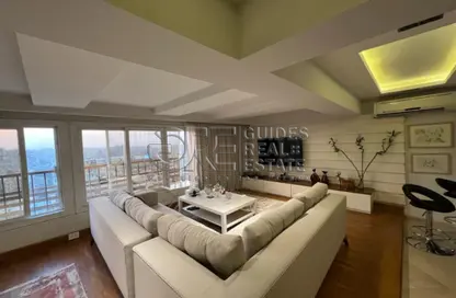 Apartment - 2 Bedrooms - 2 Bathrooms for rent in Ahmed Heshmat St. - Zamalek - Cairo