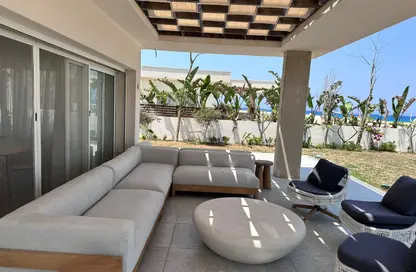 Villa - 4 Bedrooms - 5 Bathrooms for sale in Beit Al Bahr - Sidi Heneish - North Coast