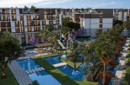 Apartment - 3 Bedrooms - 2 Bathrooms for sale in Tesla Residence - Al Wahat Road - 6 October City - Giza